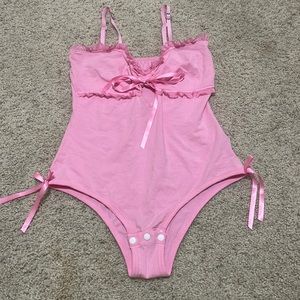 Adult onesie little for big worn once.